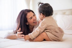 mother with her child in bed- child custody rights